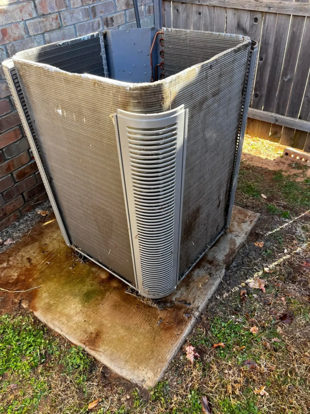 Neglected dirty condenser unit before maintenance service